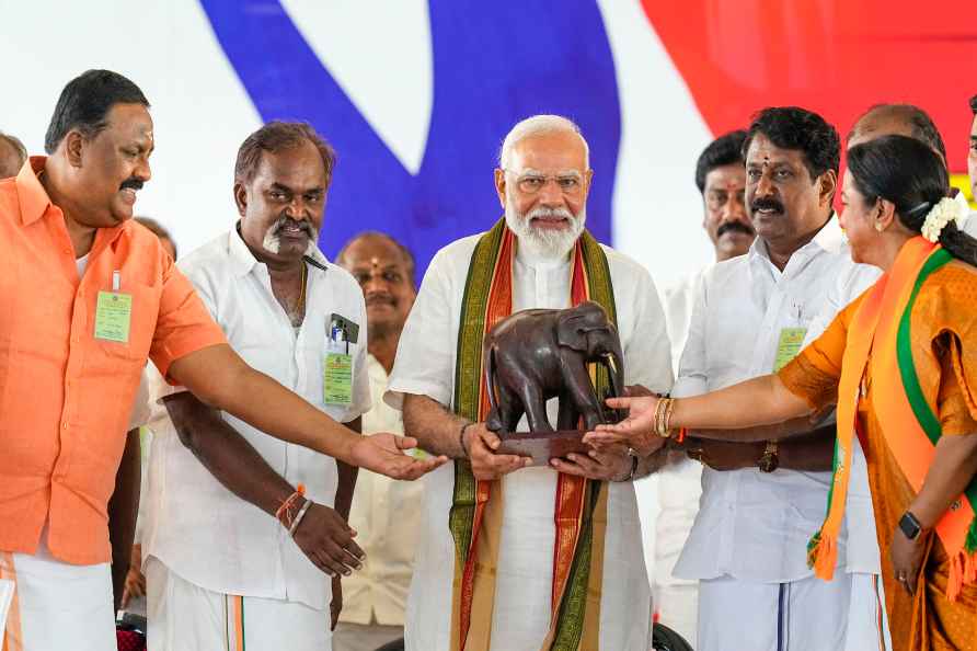 Tirunelveli: Prime Minister Narendra Modi being presented a memento...